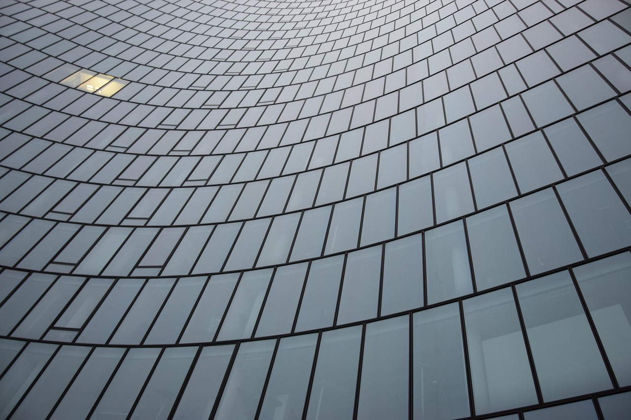 Glass building, architecture, building — How COLA Affects Social Security Payments
