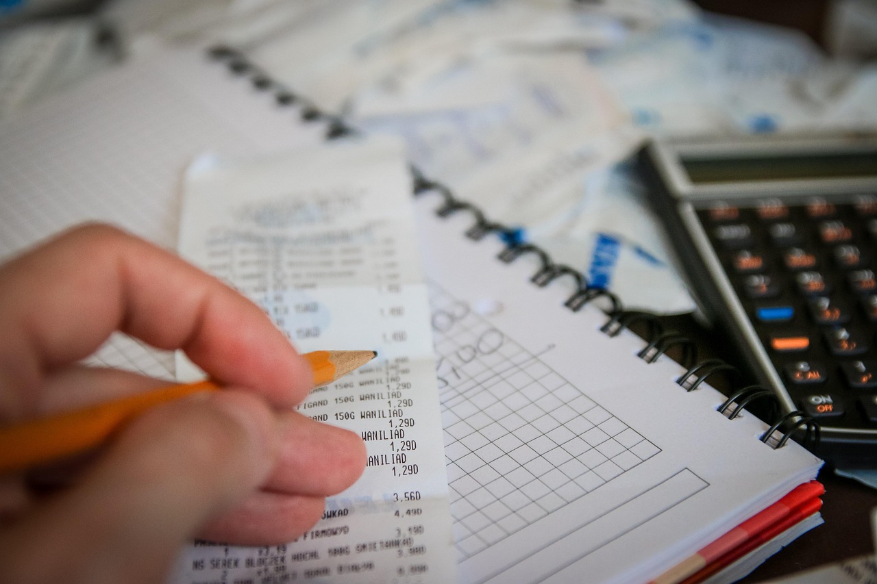 Money, bills, calculator — How Do Squatter Rights Work in New York? A Legal Guide